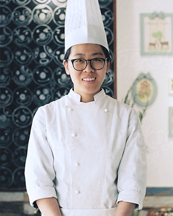 A Central Piedmont culinary arts student wearing a chef's uniform