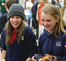 Two Central Piedmont students working together in a lab