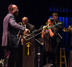 A group of Central Piedmont music students performing on stage together