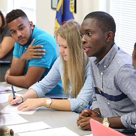 Three Central Piedmont students in a classroom