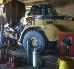 cat truck in garage