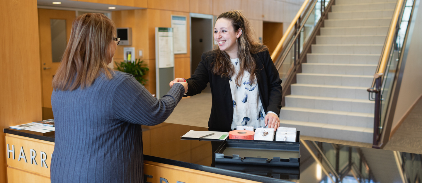 Hospitality Management program student with guest