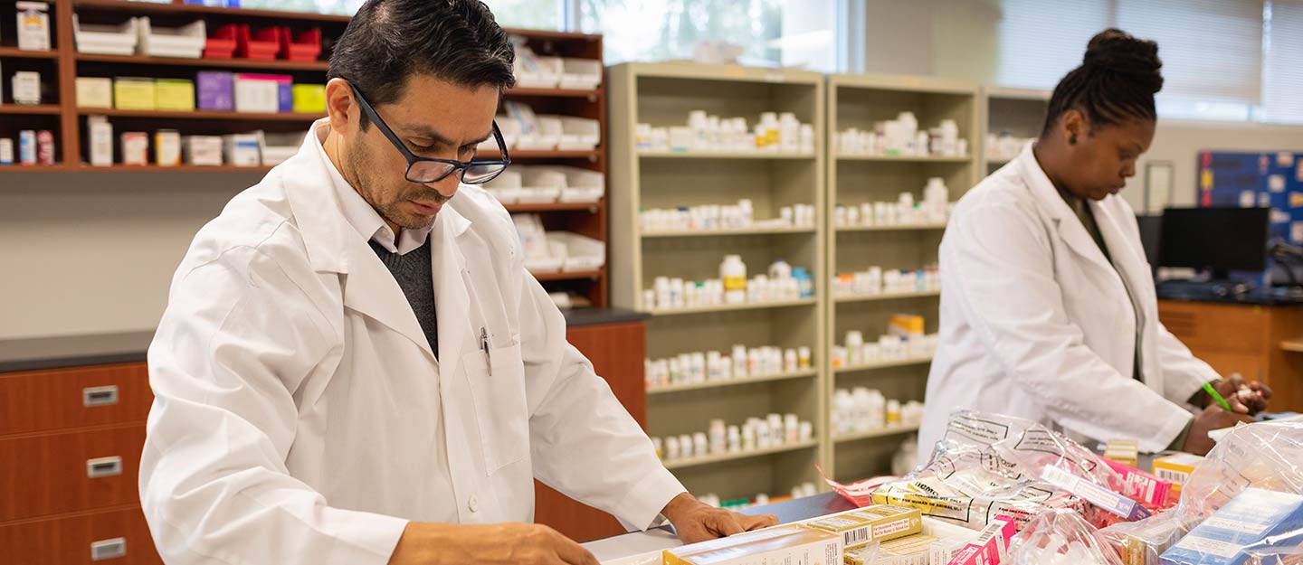 People working at a pharmacy