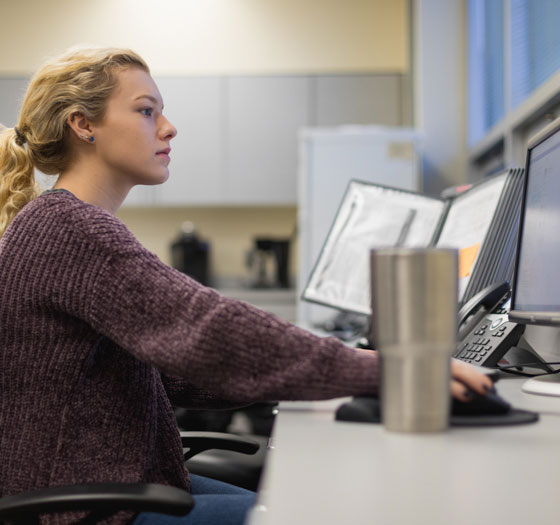 Woman doing research on a computer