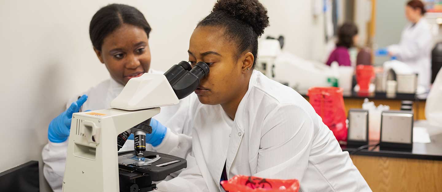 Using a microscope in a lab