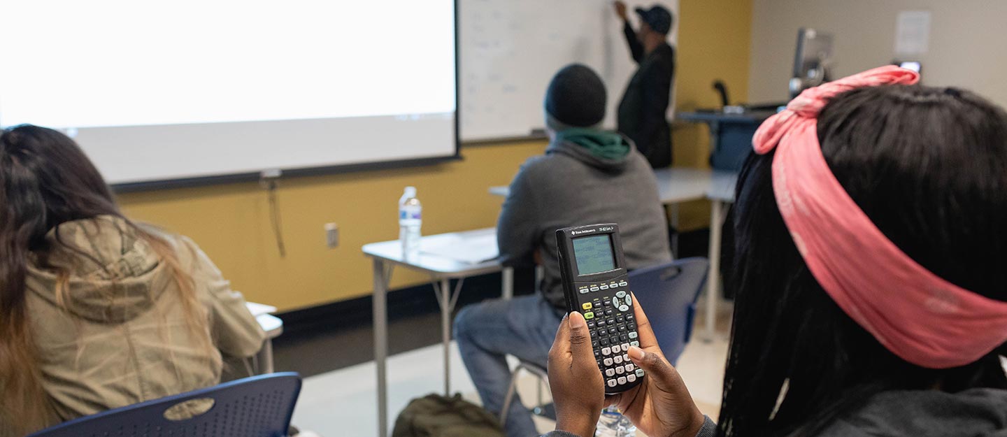 Student using a calculator