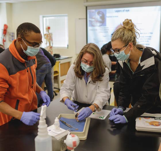 Science students practicing in the lab