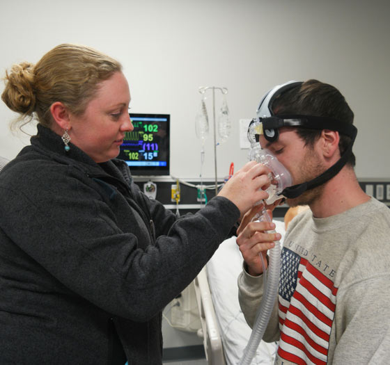 patient using breathing mask