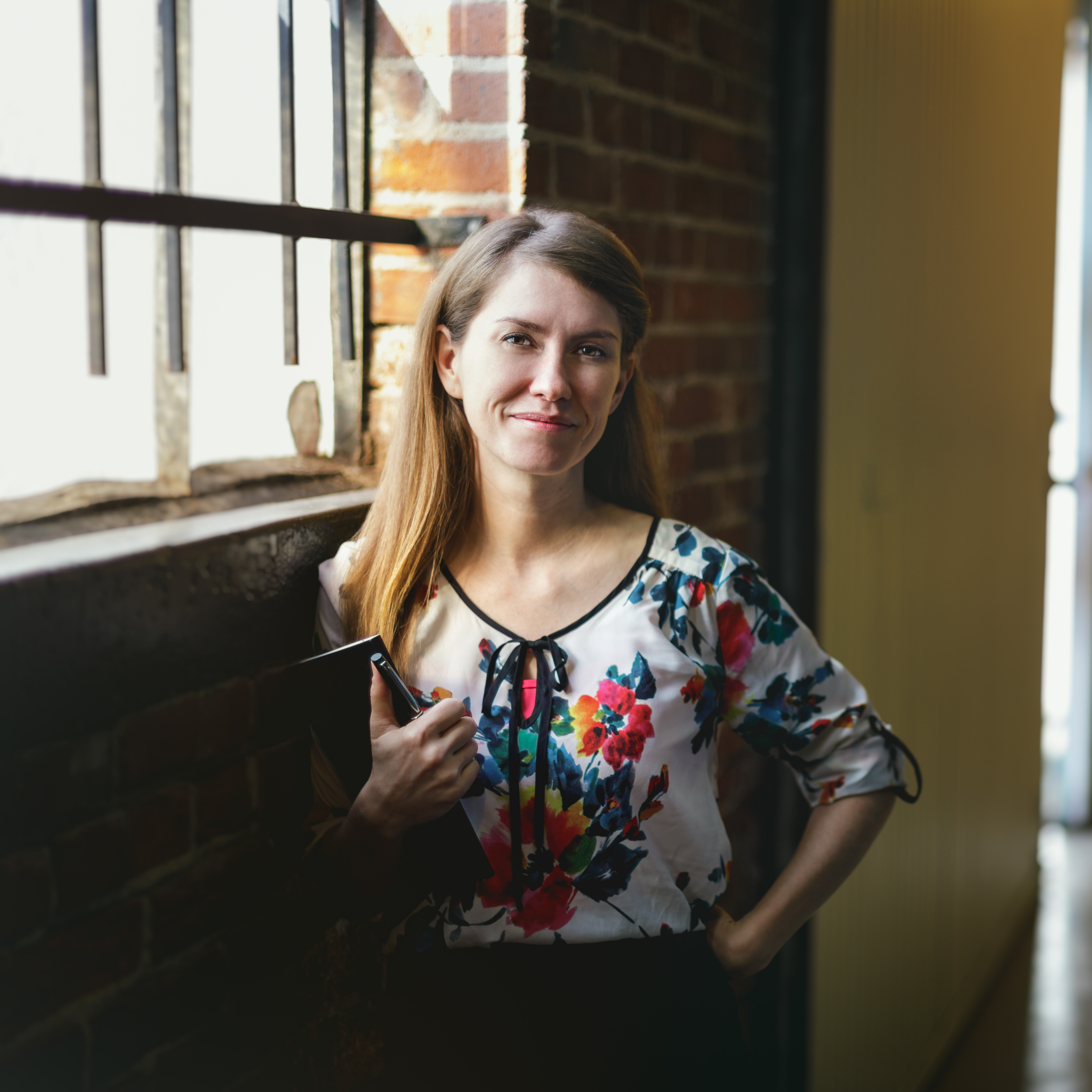 Sarah Booth continuing education student smiling by window