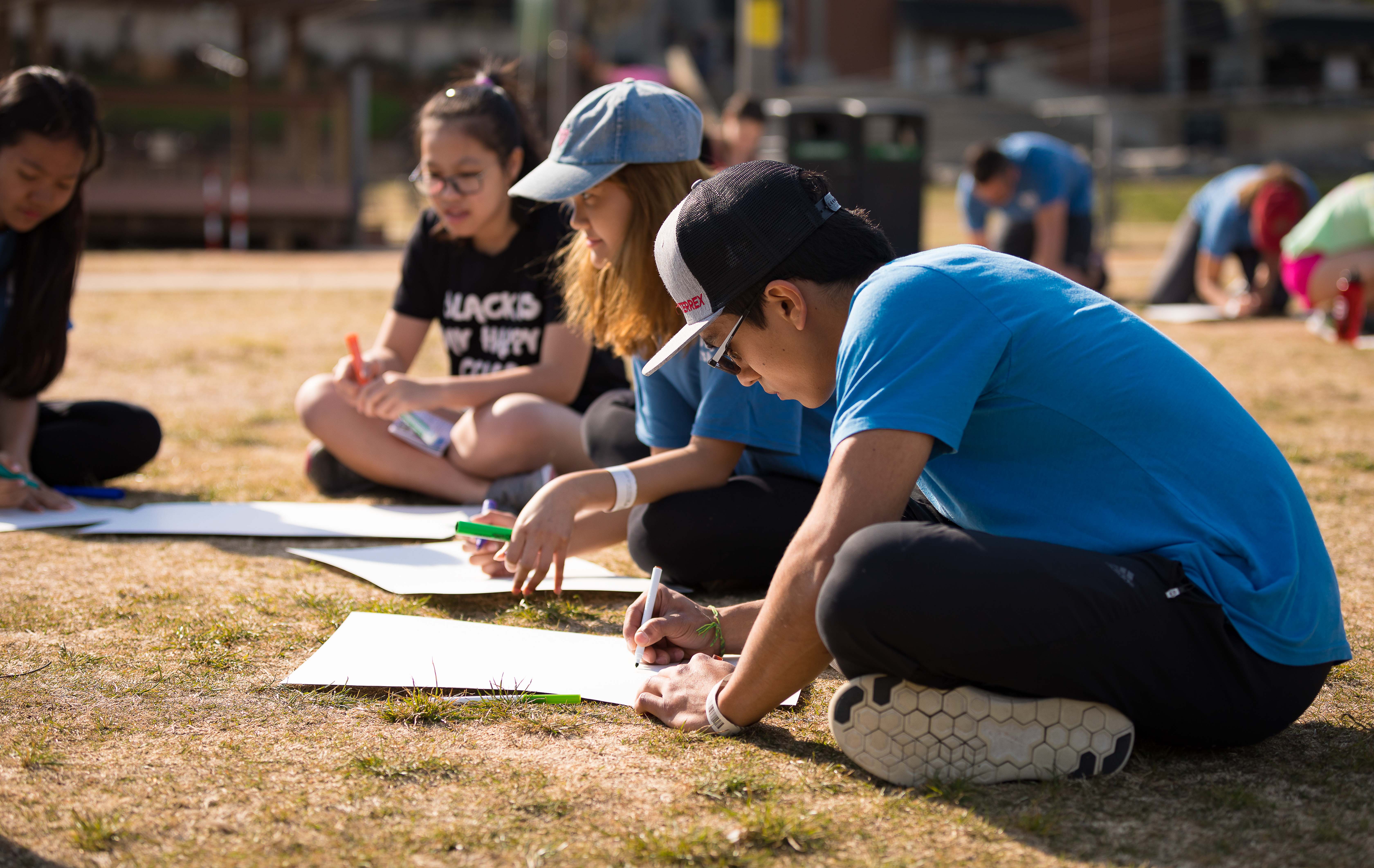 students doing activity outside