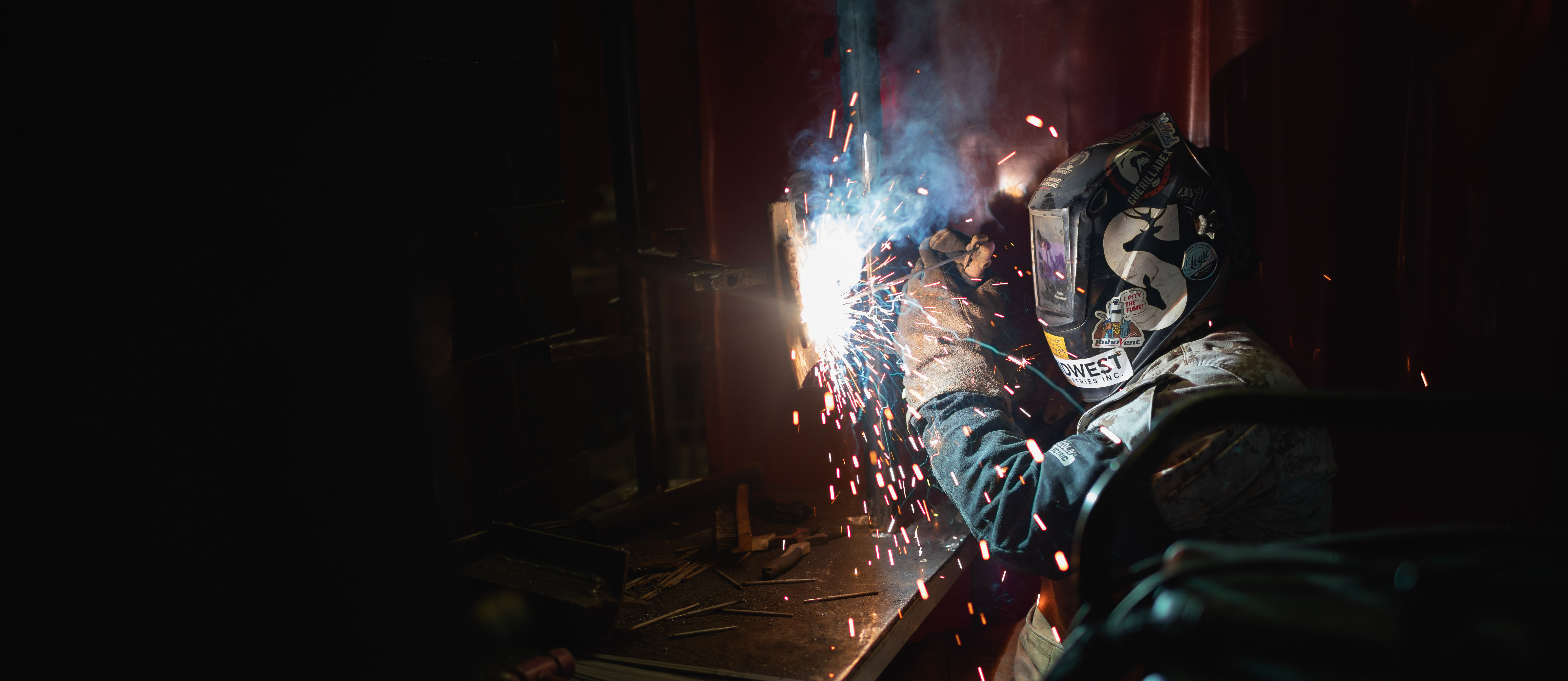 welding student making sparks