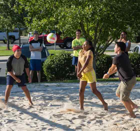 Students playing volleyball