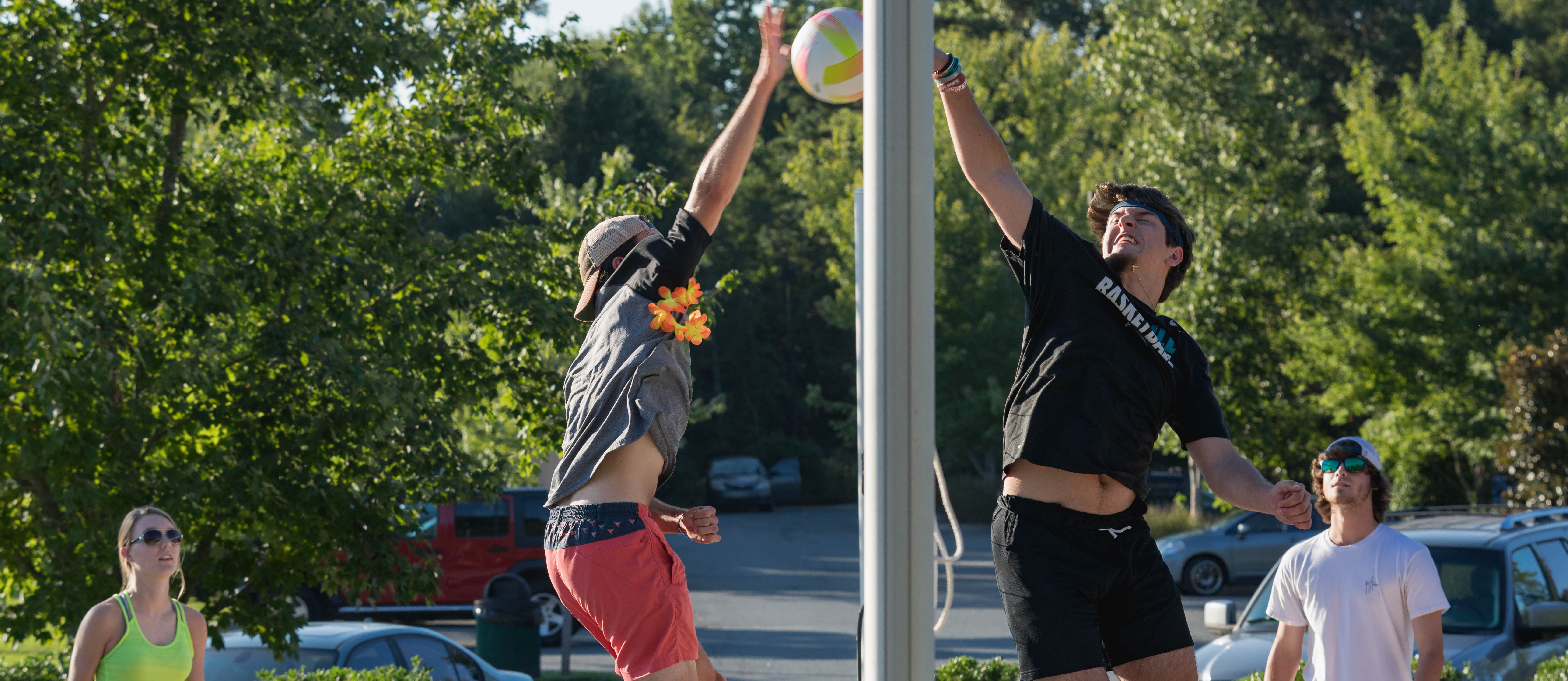 students playing volleyball