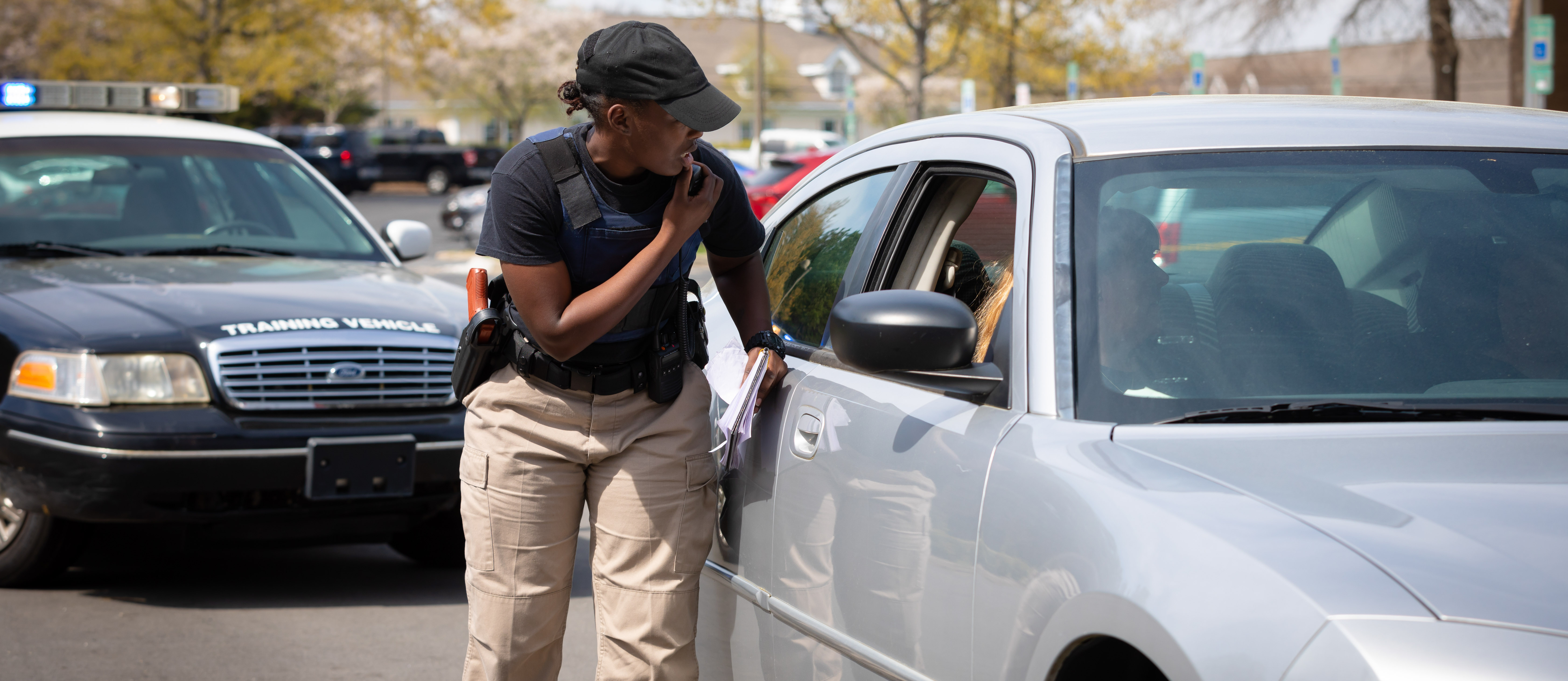 basic law enforcement training student in traffic stop simulation