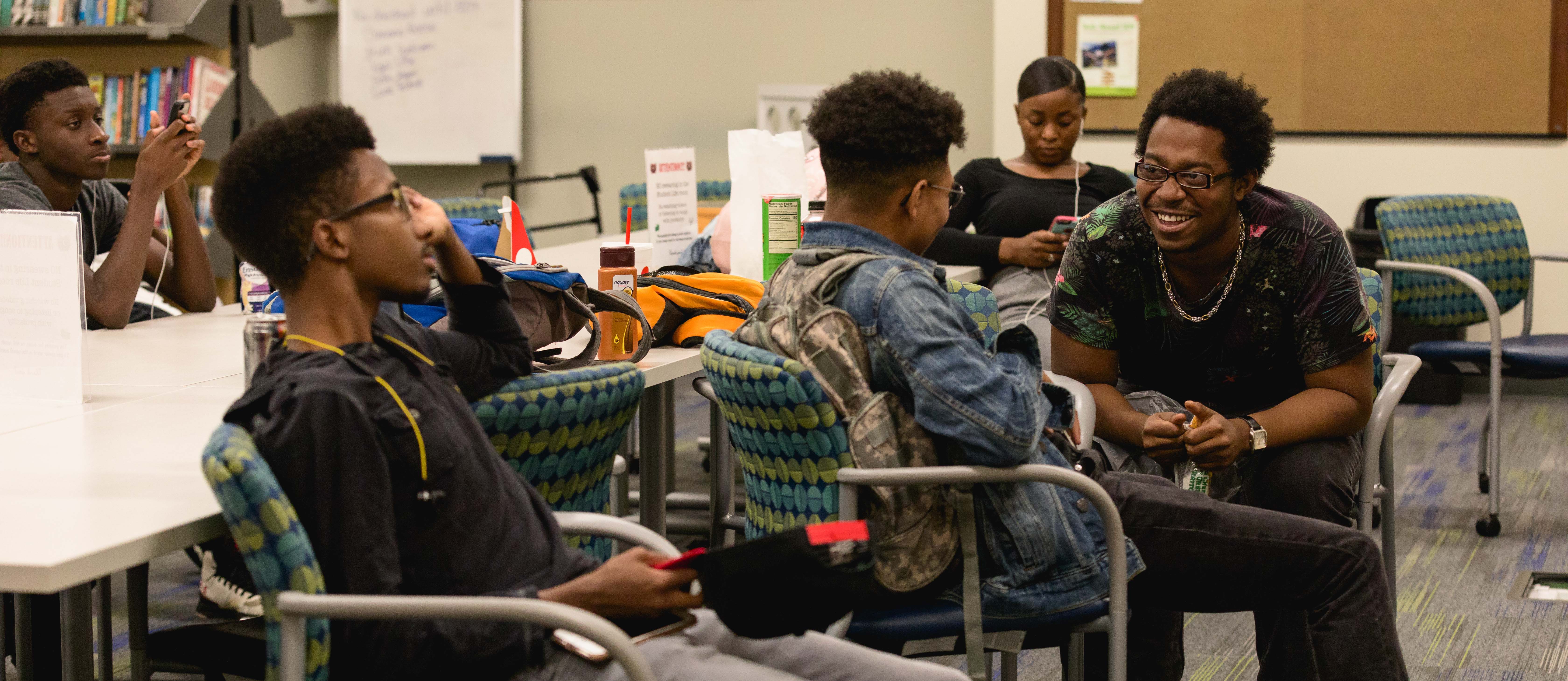 students chatting in room