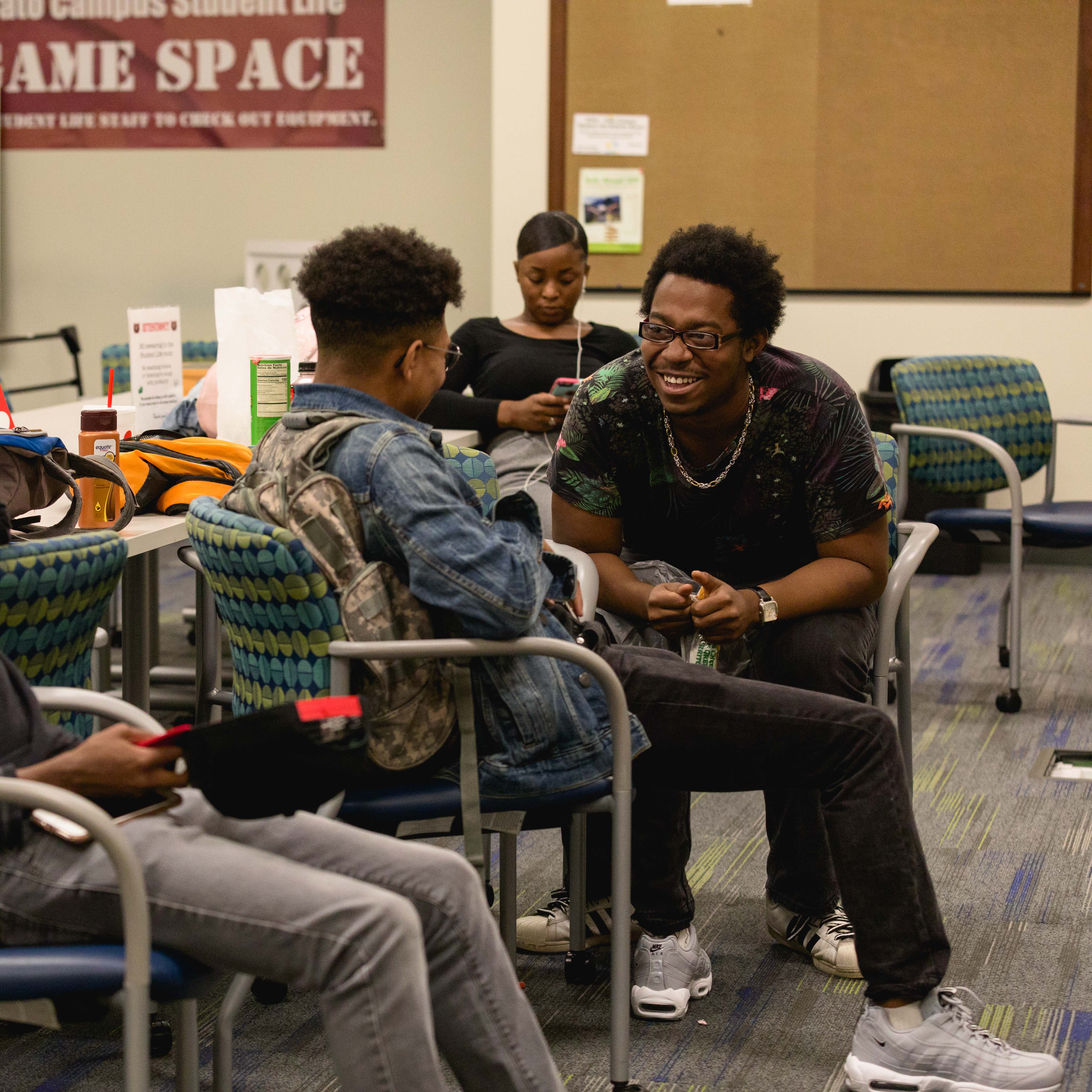 students chatting in room