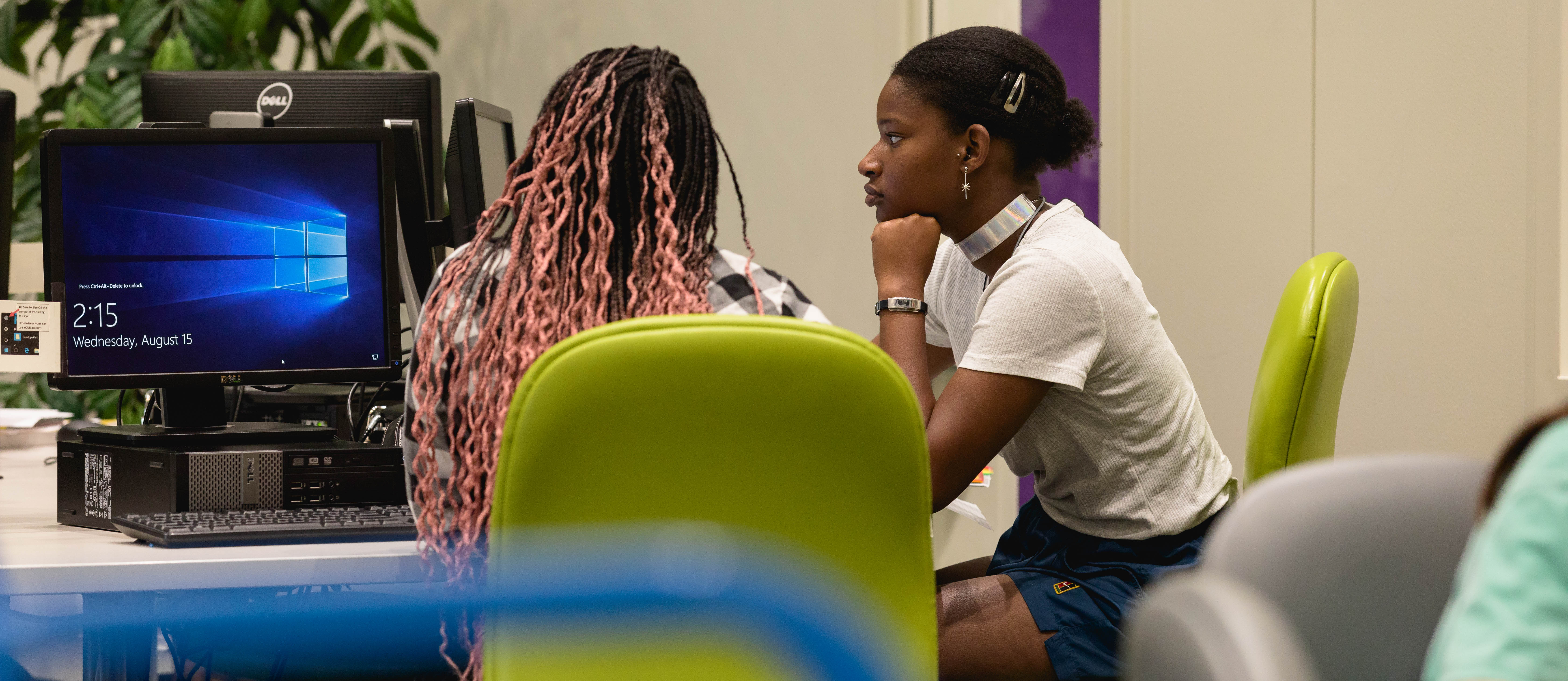 students working at computer