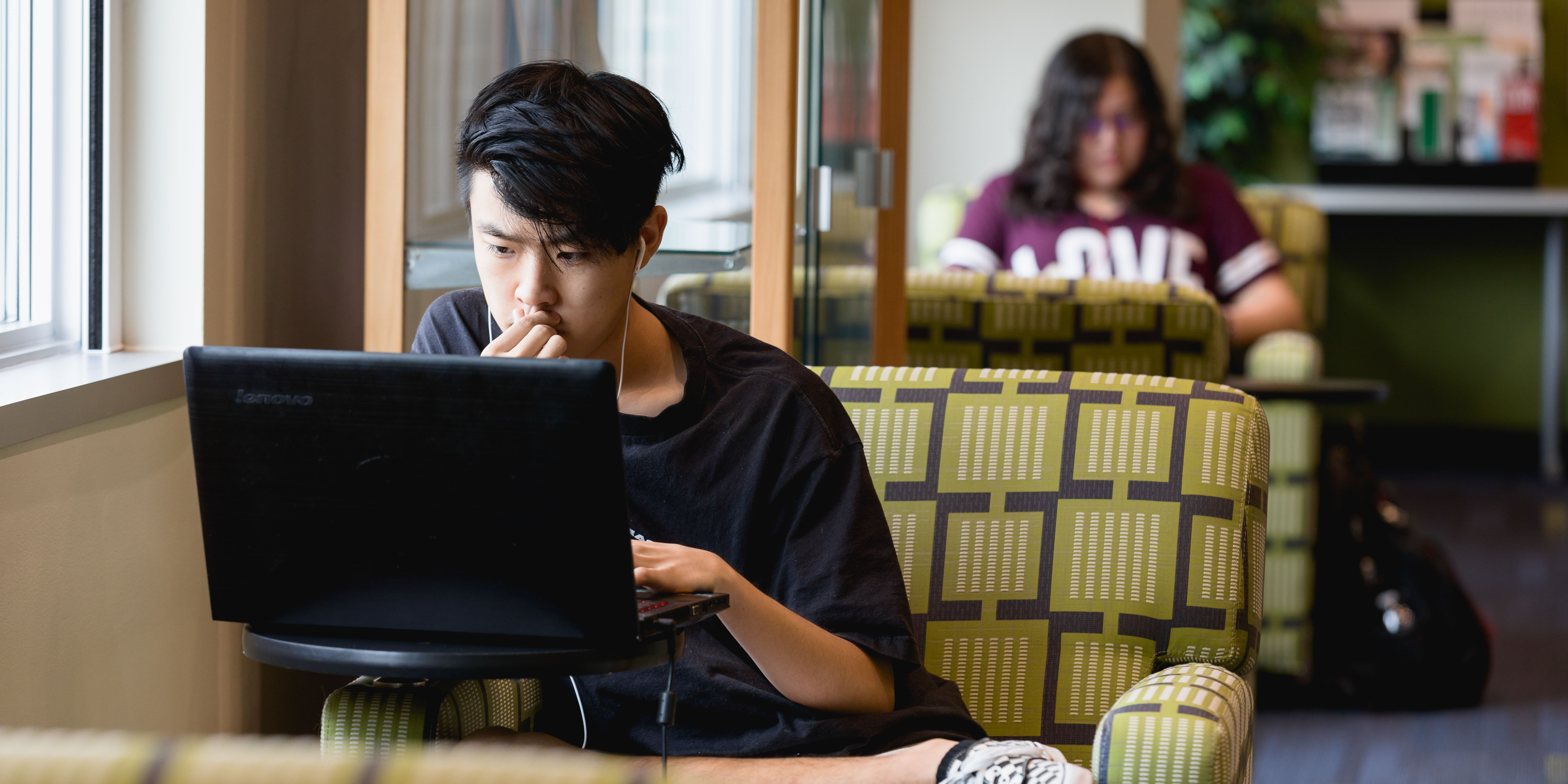 student working on laptop