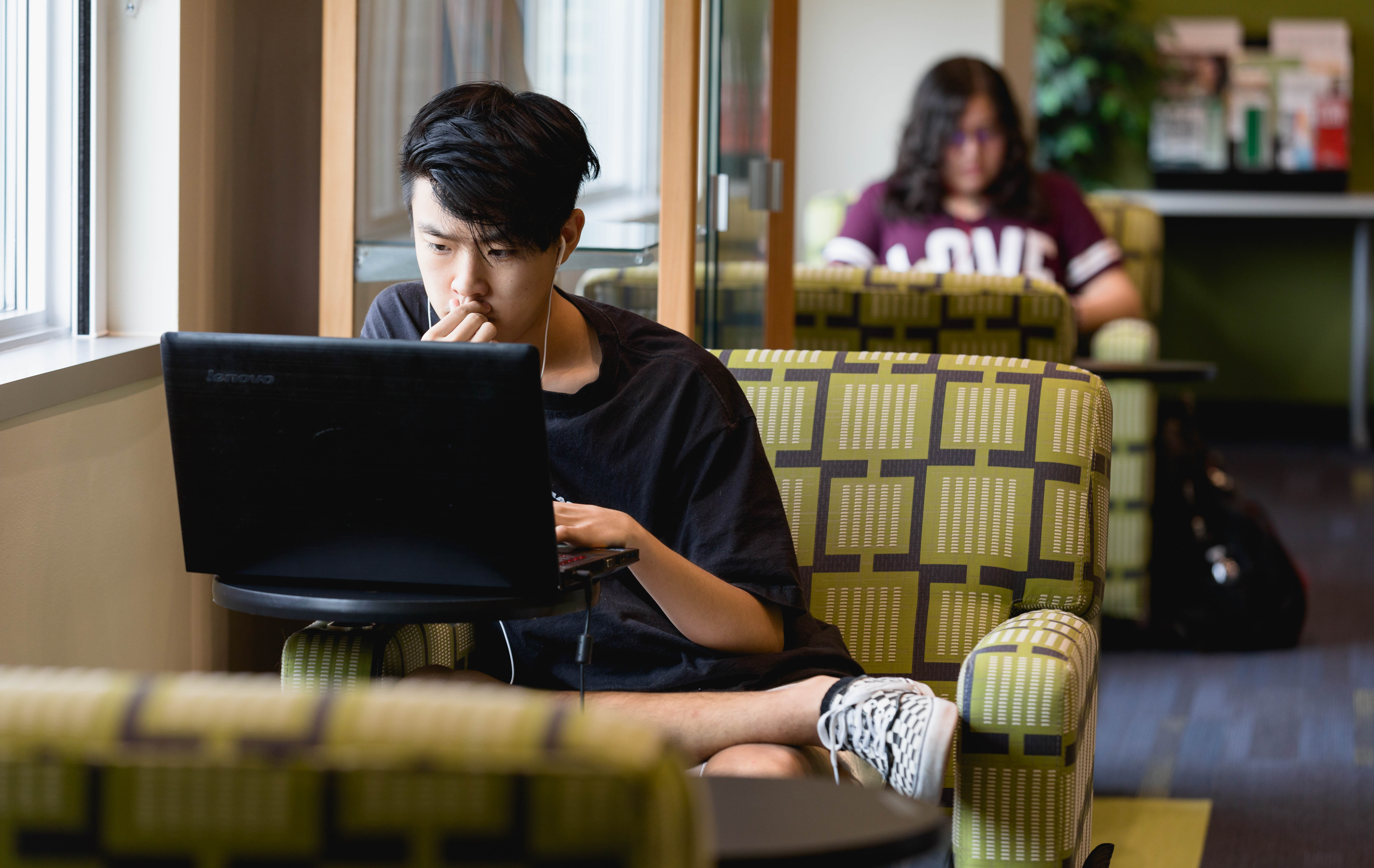 student working on laptop