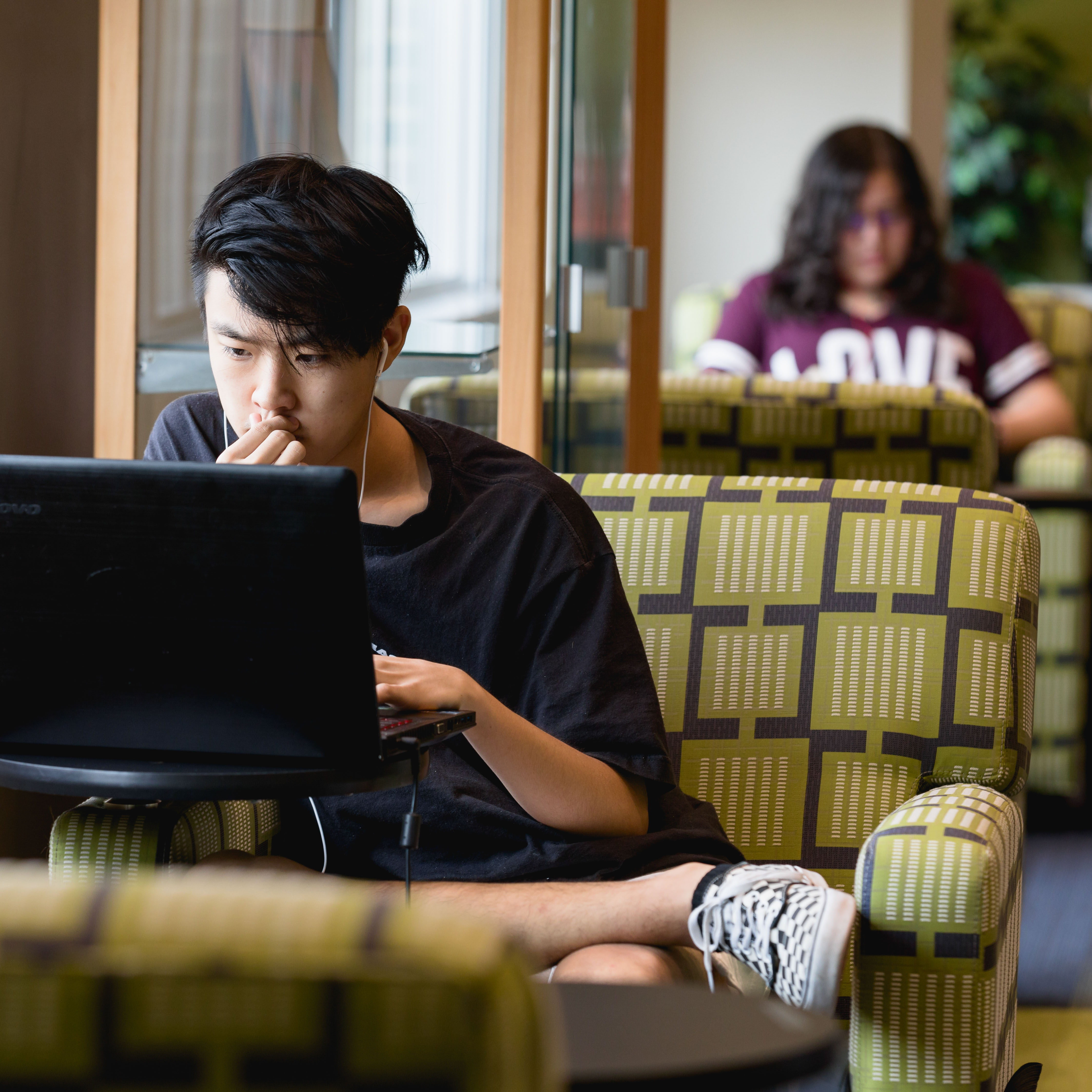 student working on laptop