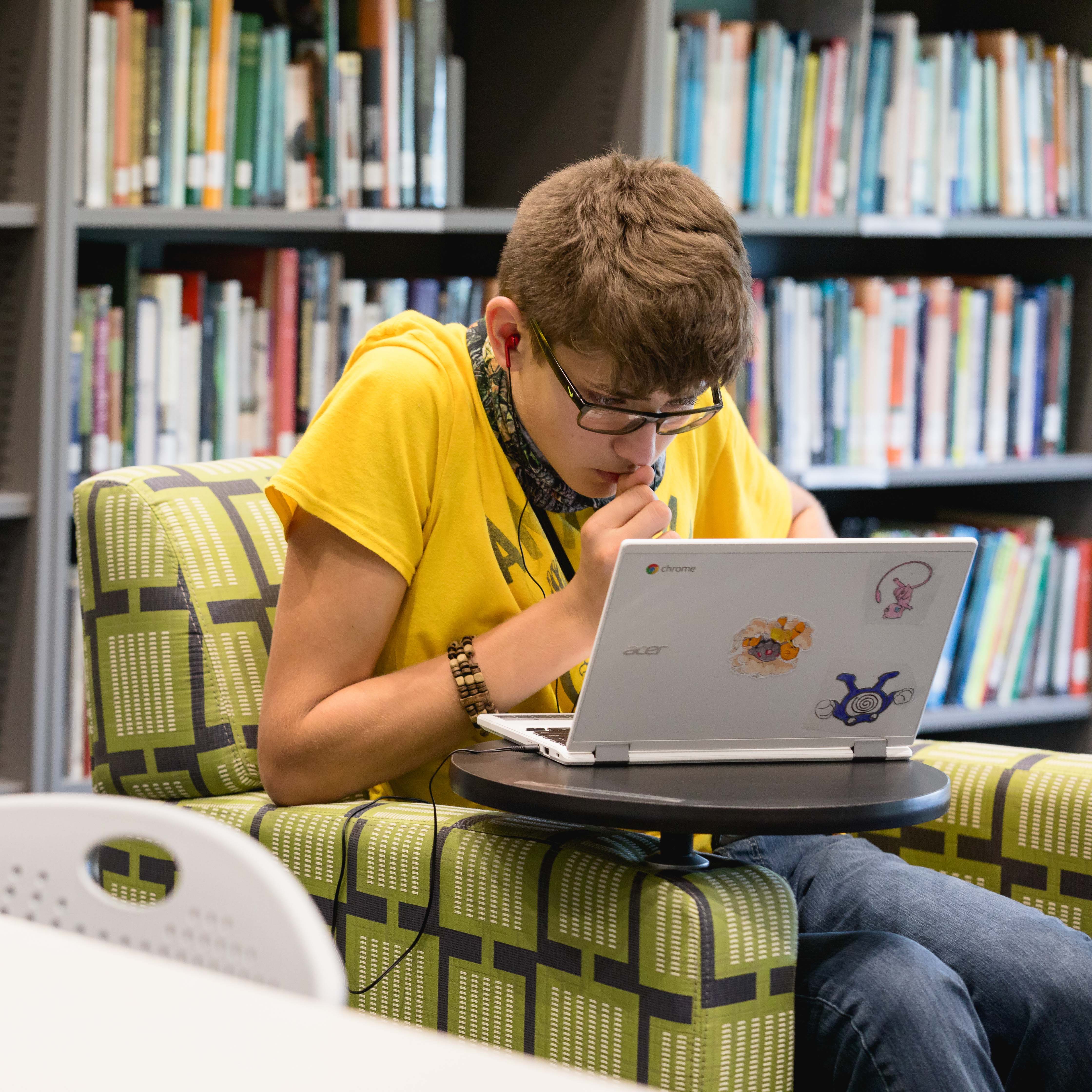 student working on laptop