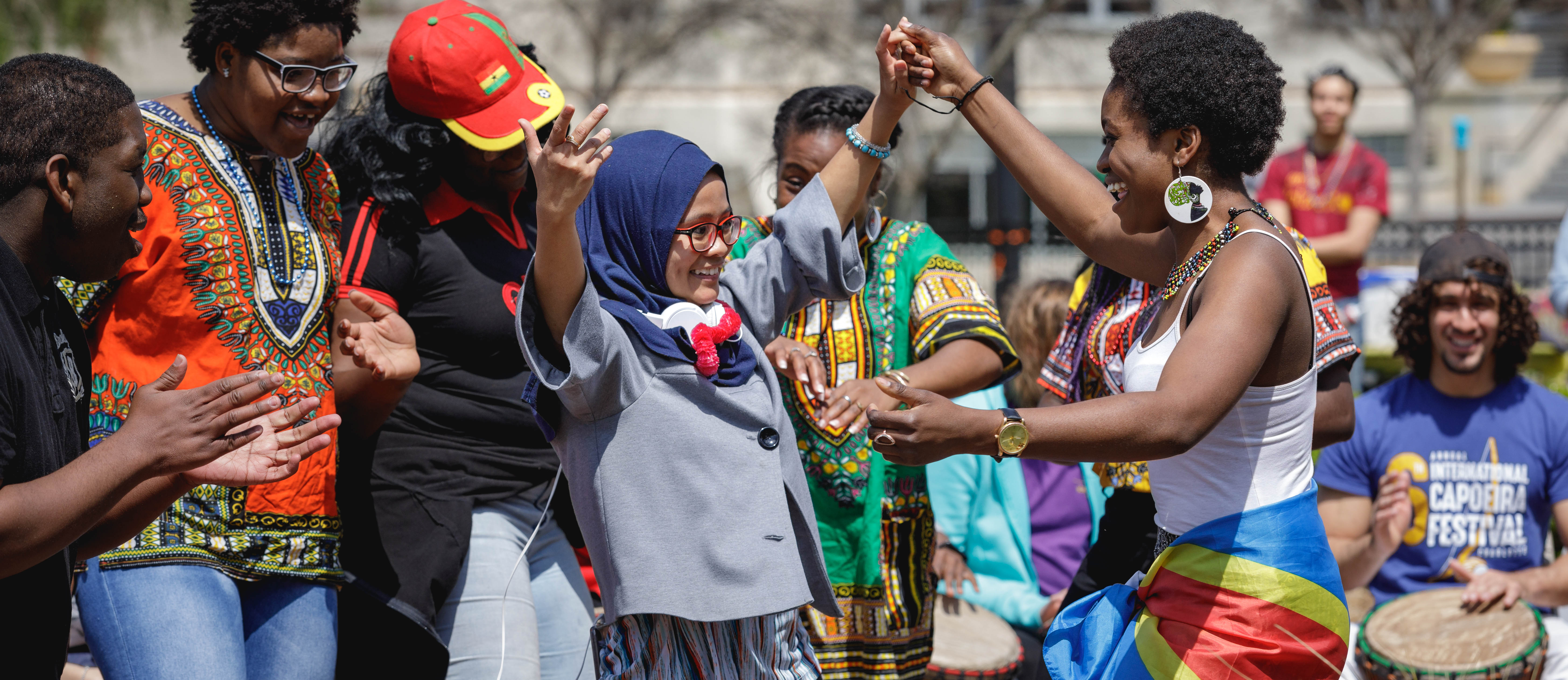 students dancing at spring festival