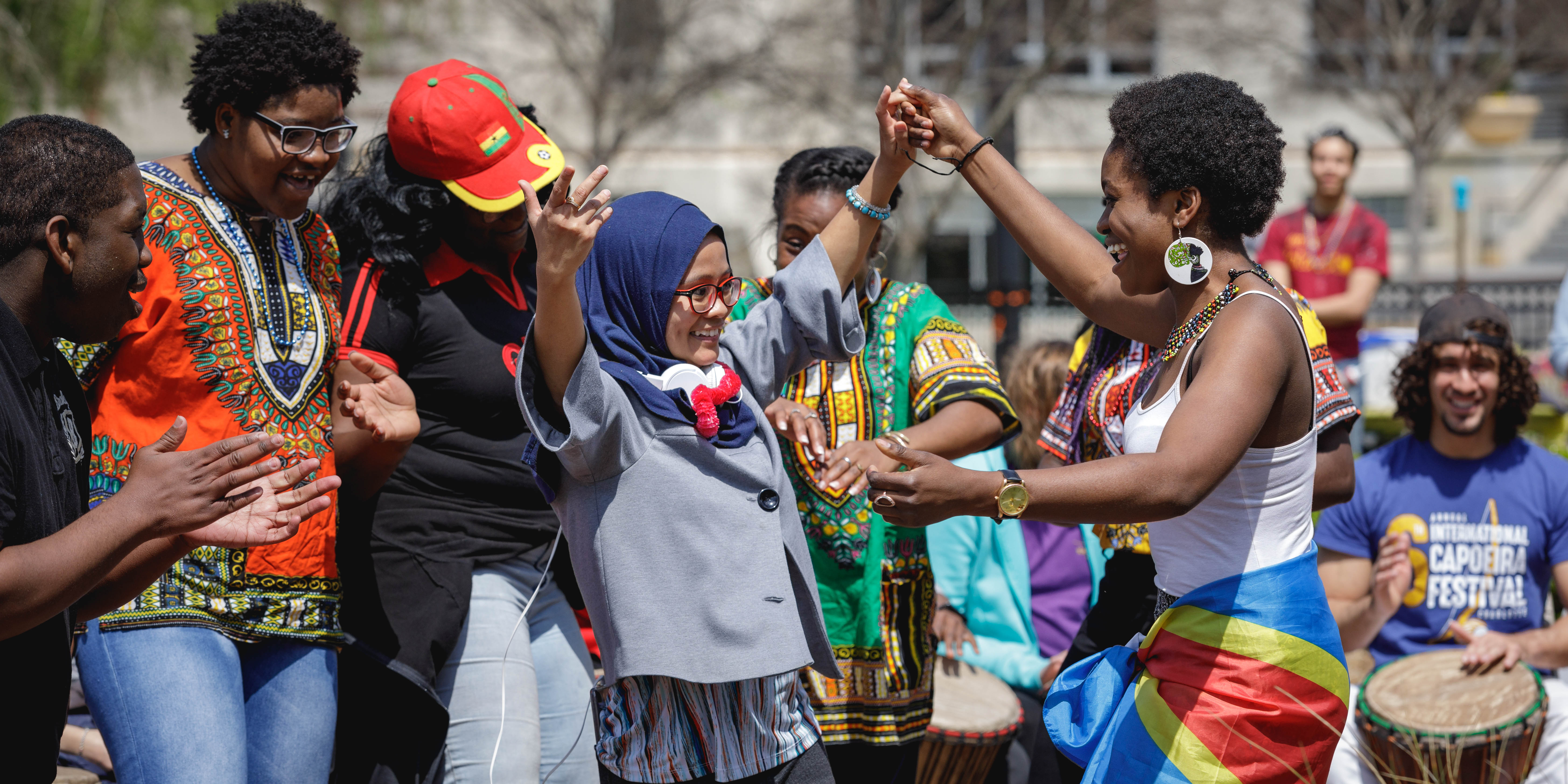 students dancing at spring festival