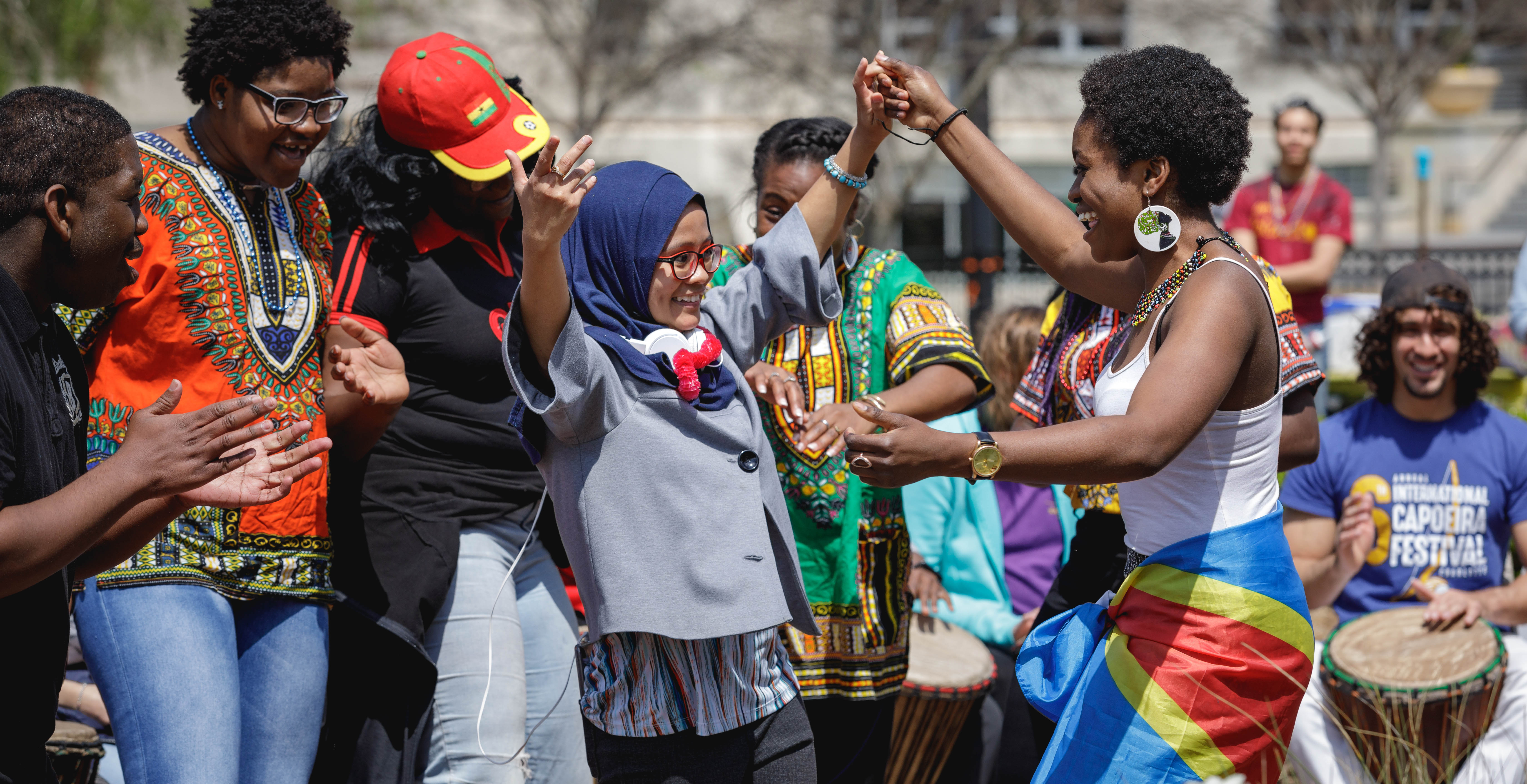 students dancing at spring festival