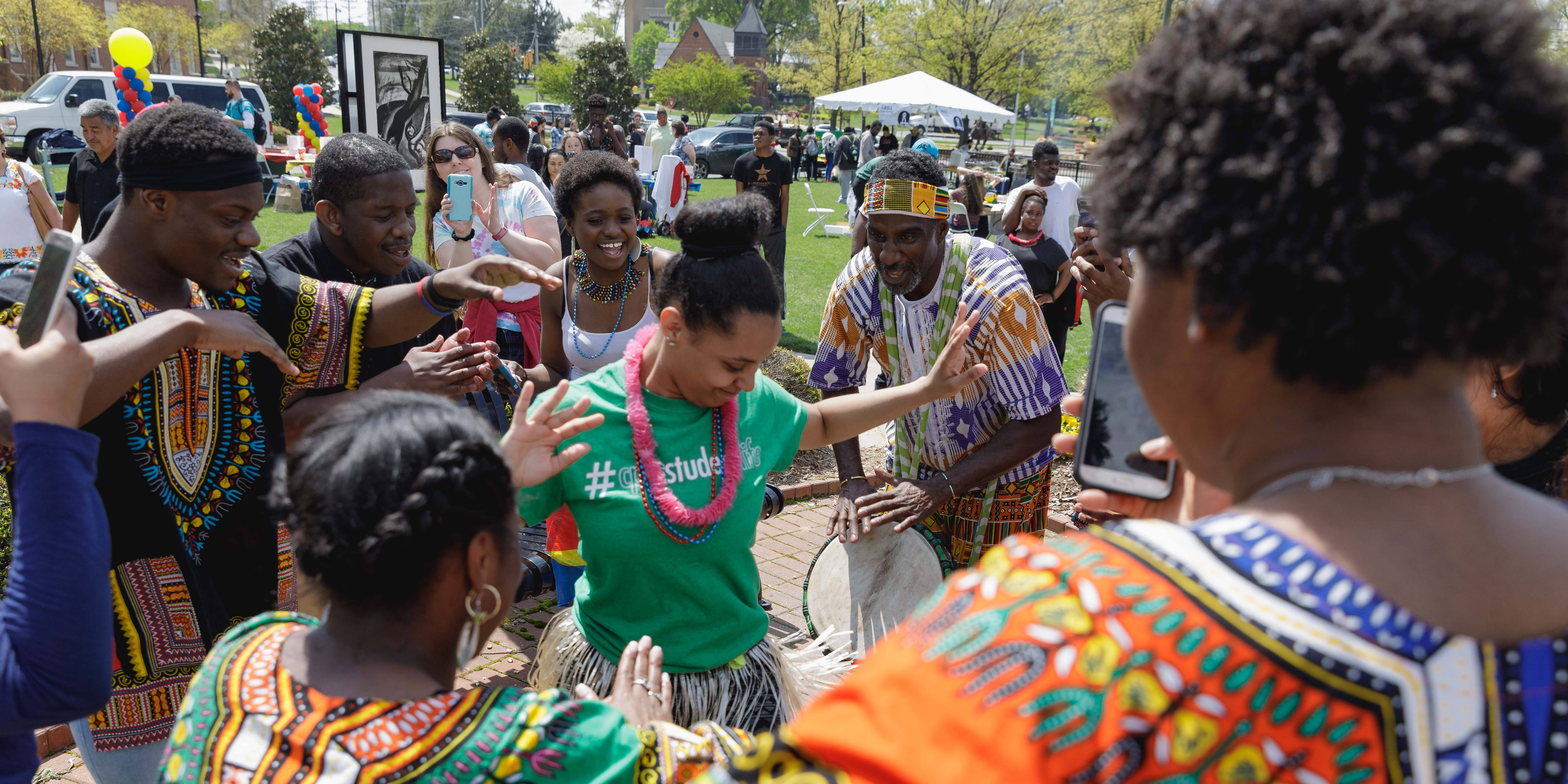 students dancing at spring festival