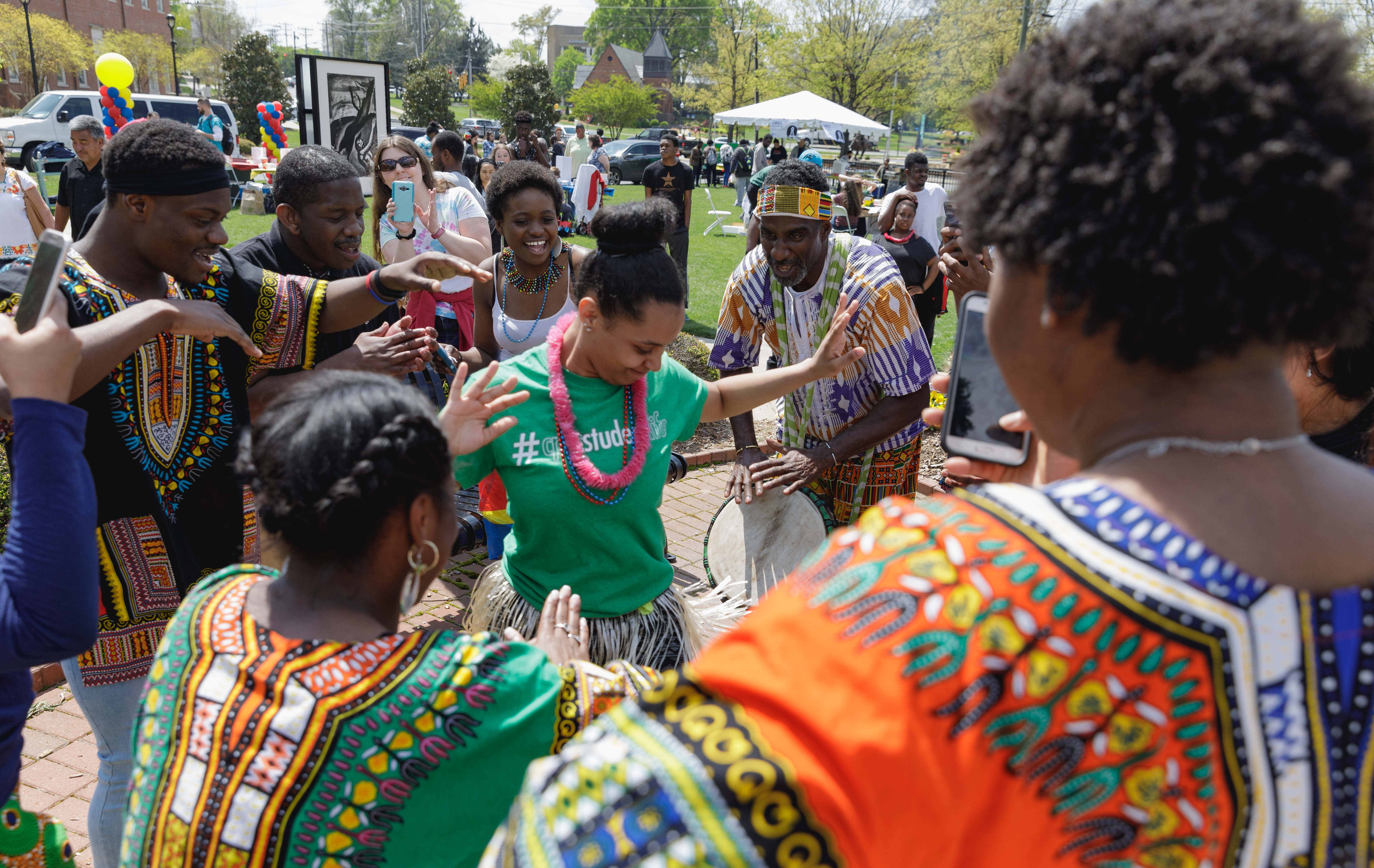 students dancing at spring festival