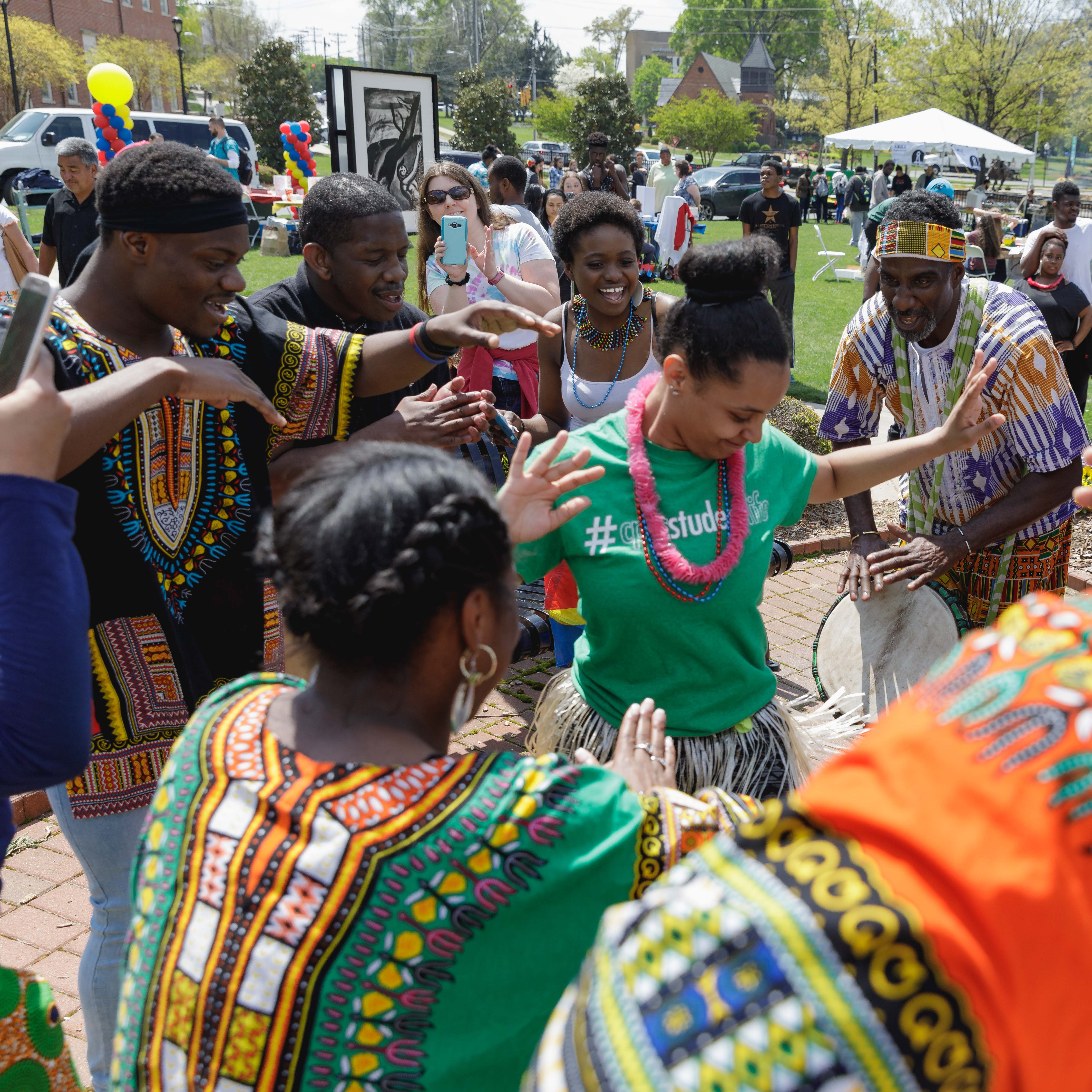 students dancing at spring festival