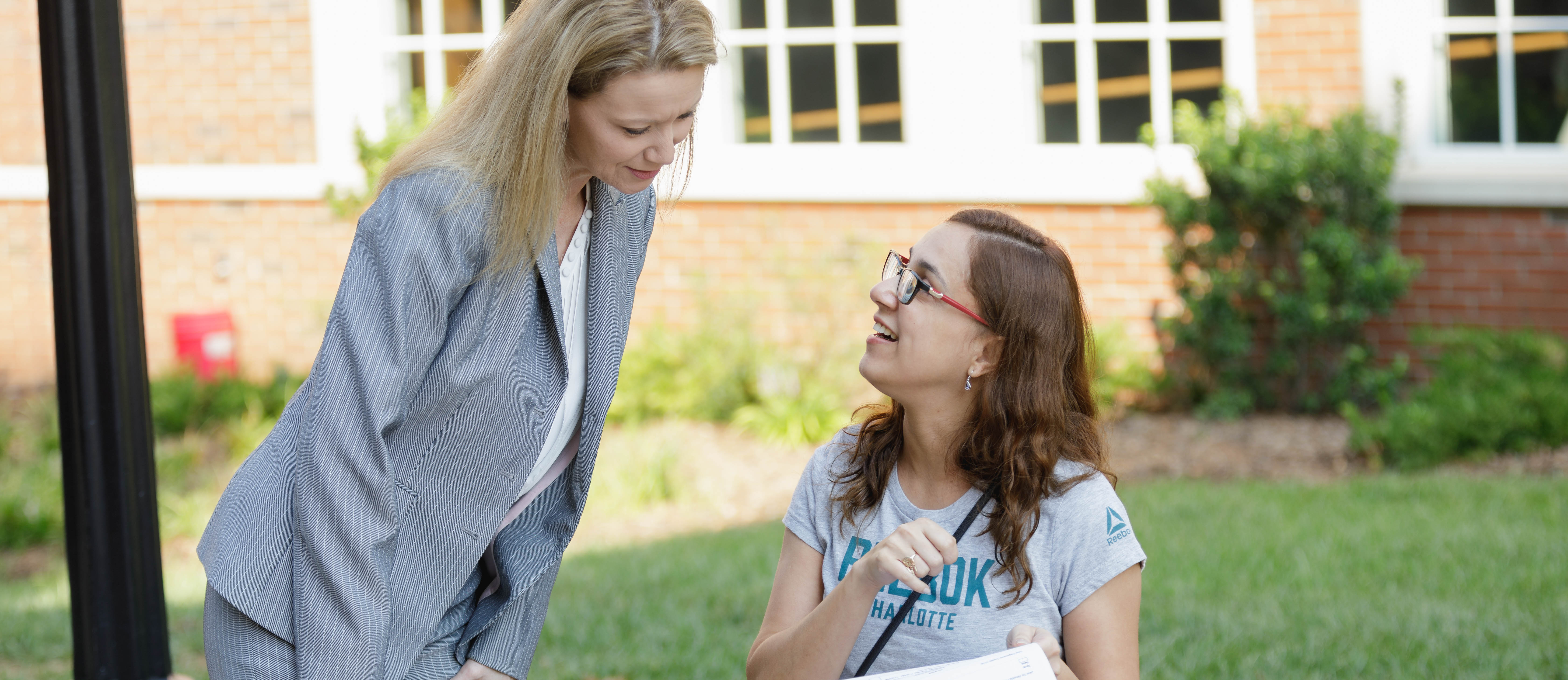 Dr. Deitemeyer helping student