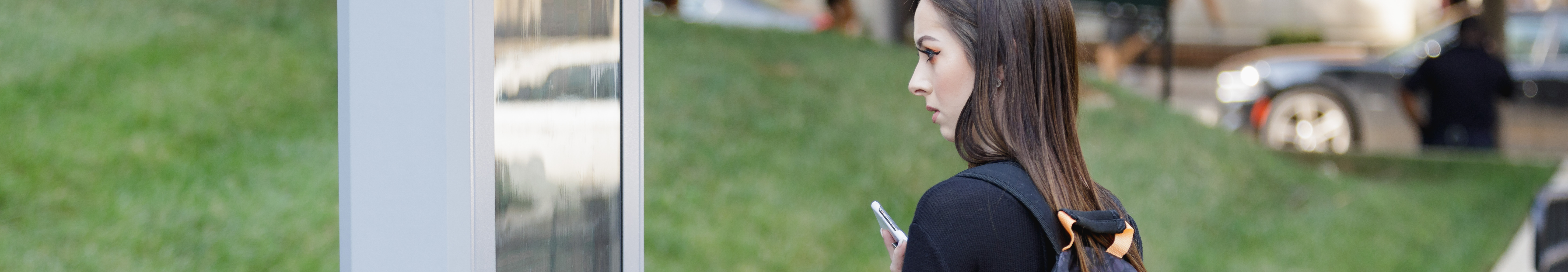 student using map on campus