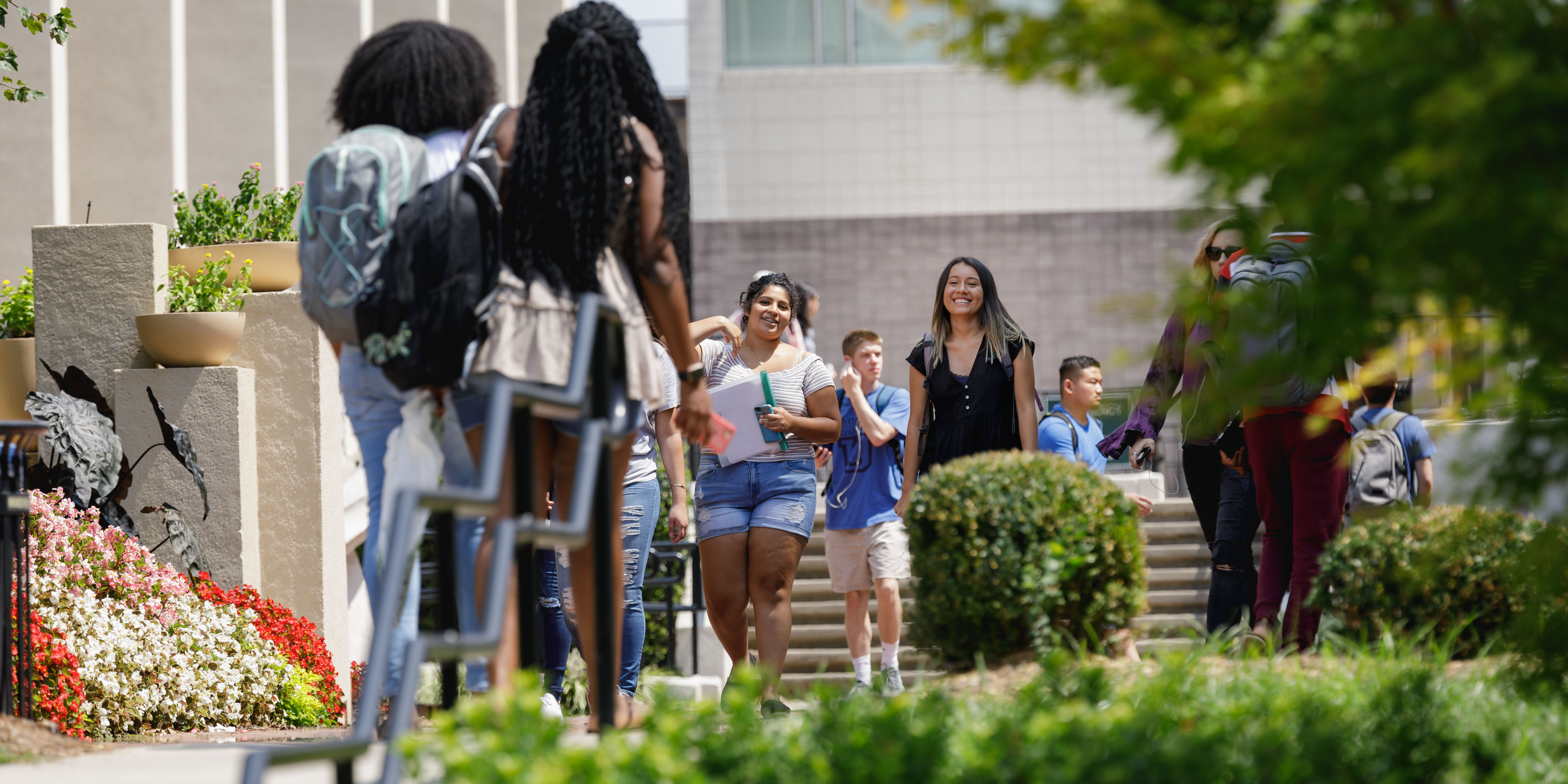 student using map on campus