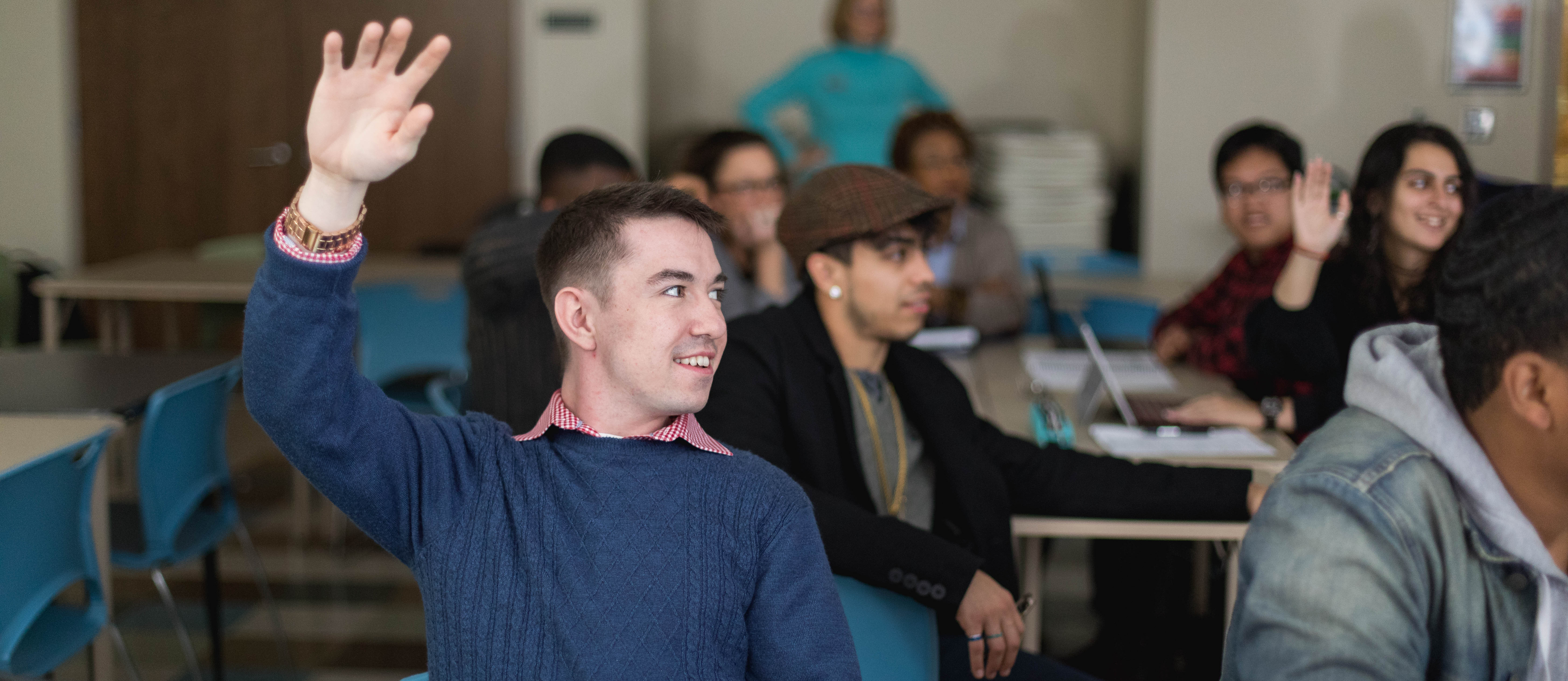 raising hand in classroom