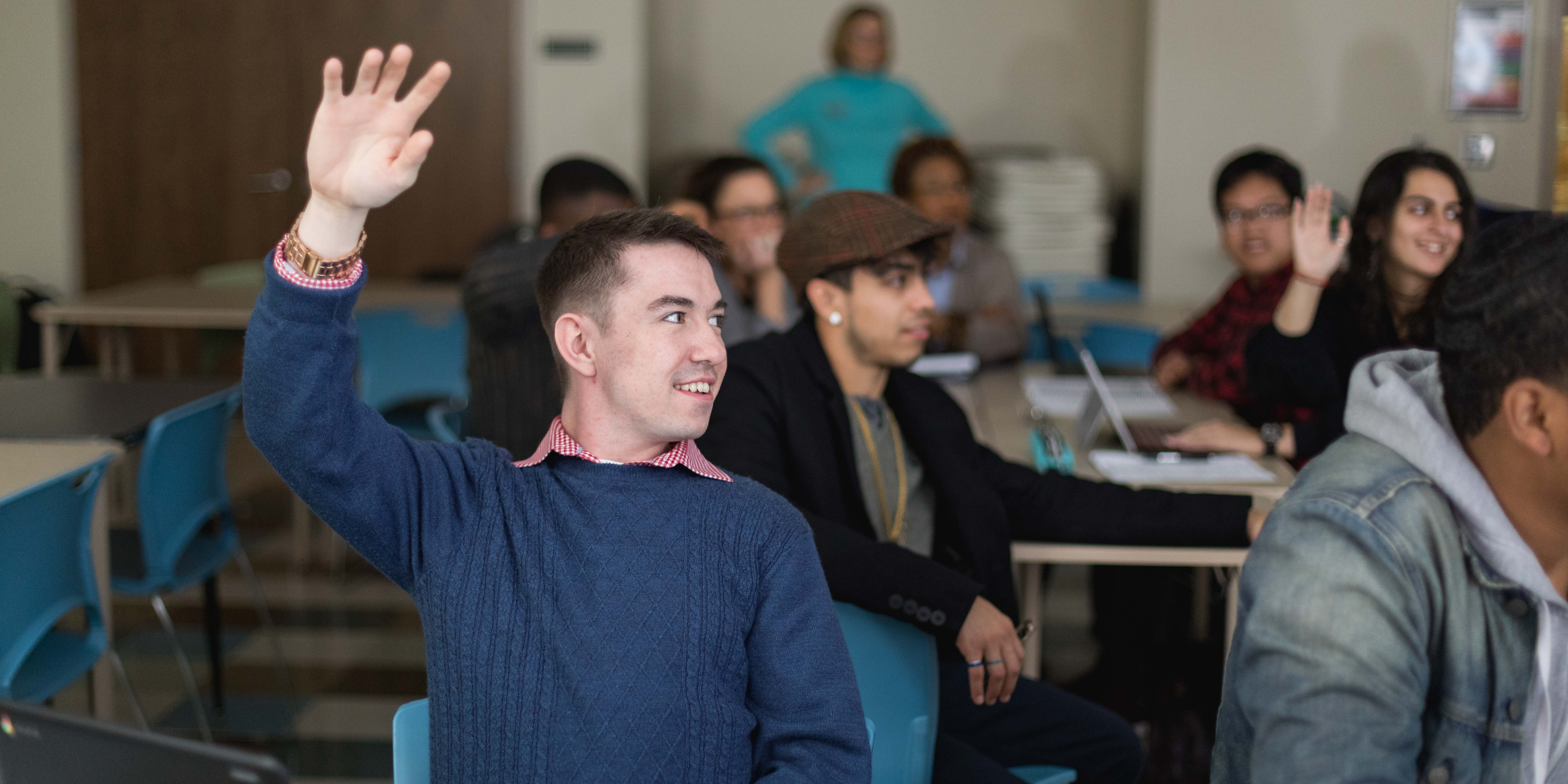 raising hand in classroom