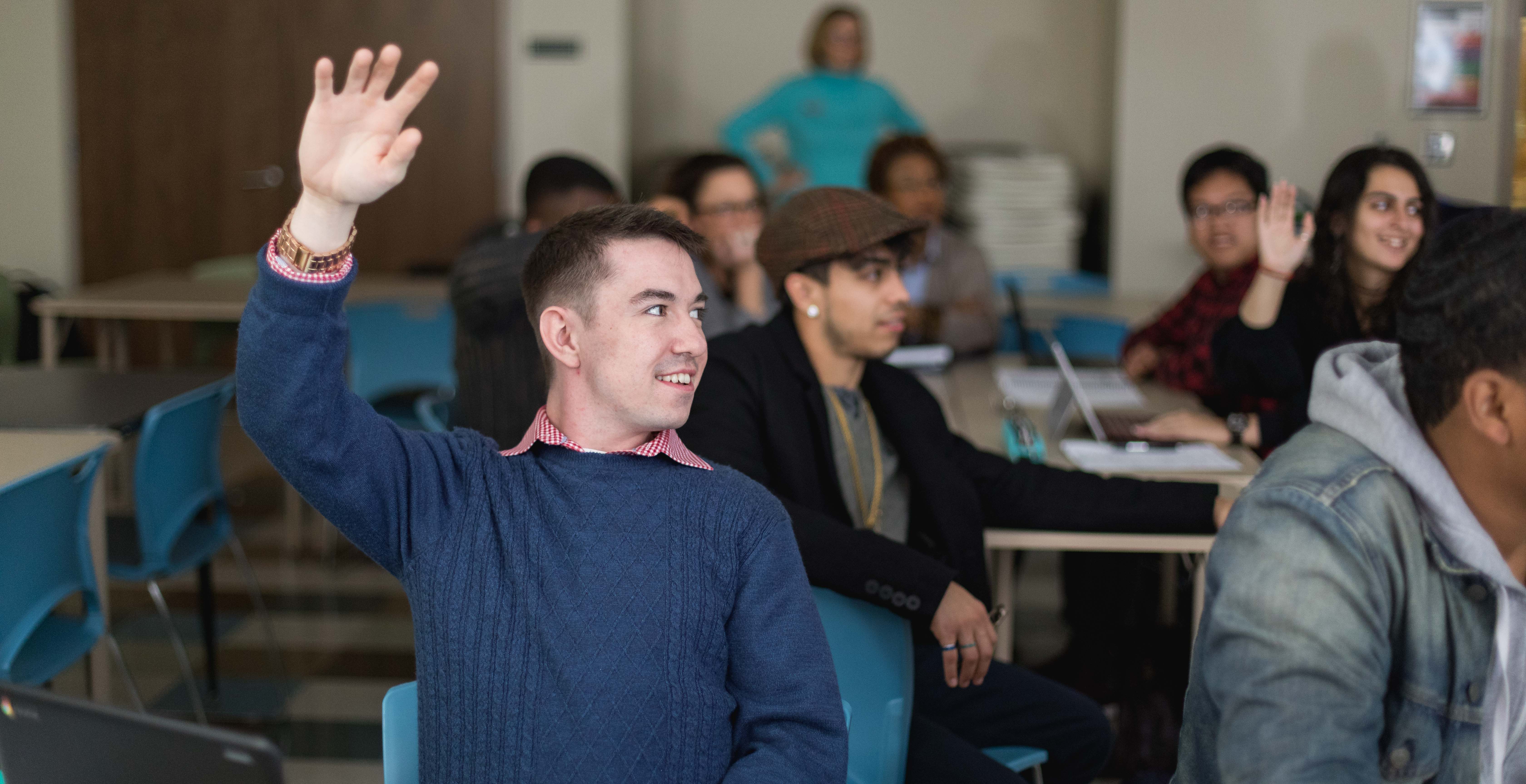 raising hand in classroom