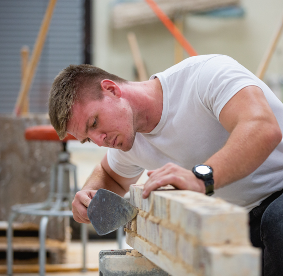 man doing masonry