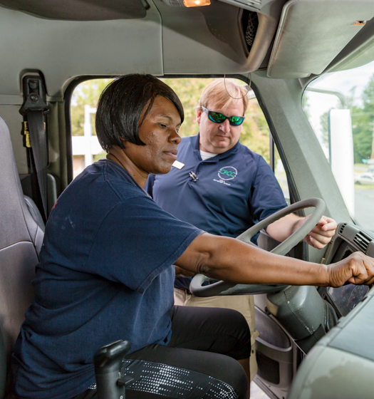 woman learning to drive commercial truck