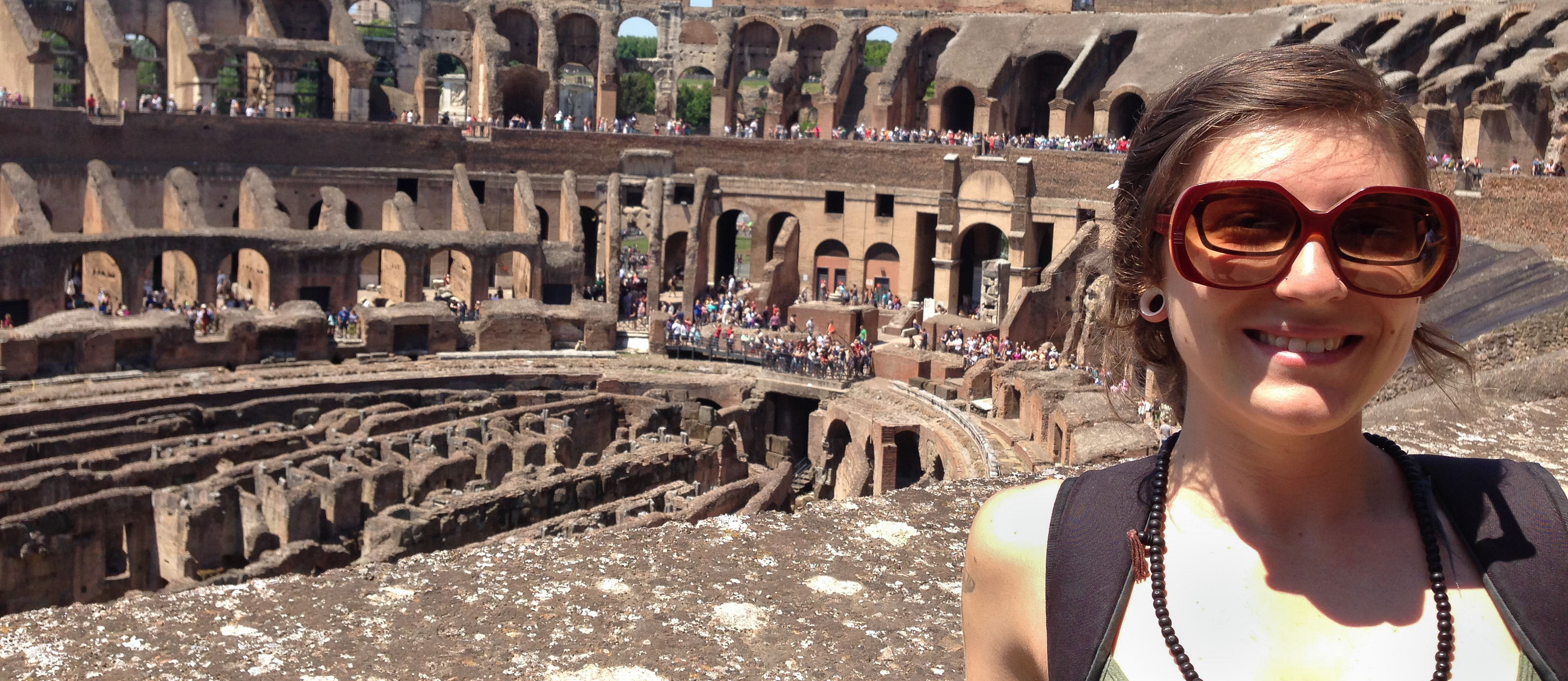 study abroad student at Roman Coliseum in Italy