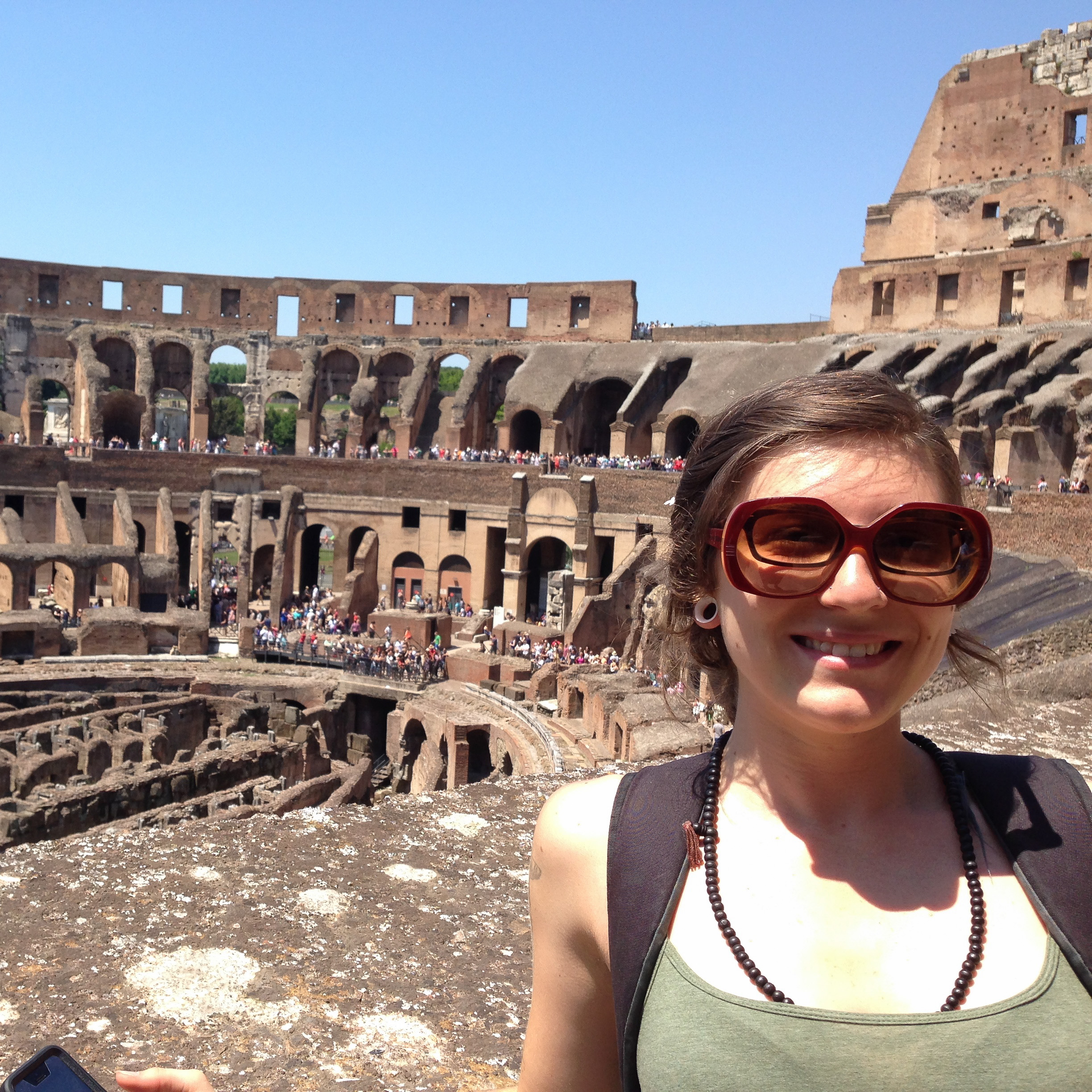 study abroad student at Roman Coliseum in Italy