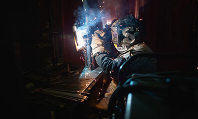 Aaron A. welding with a lot of sparks