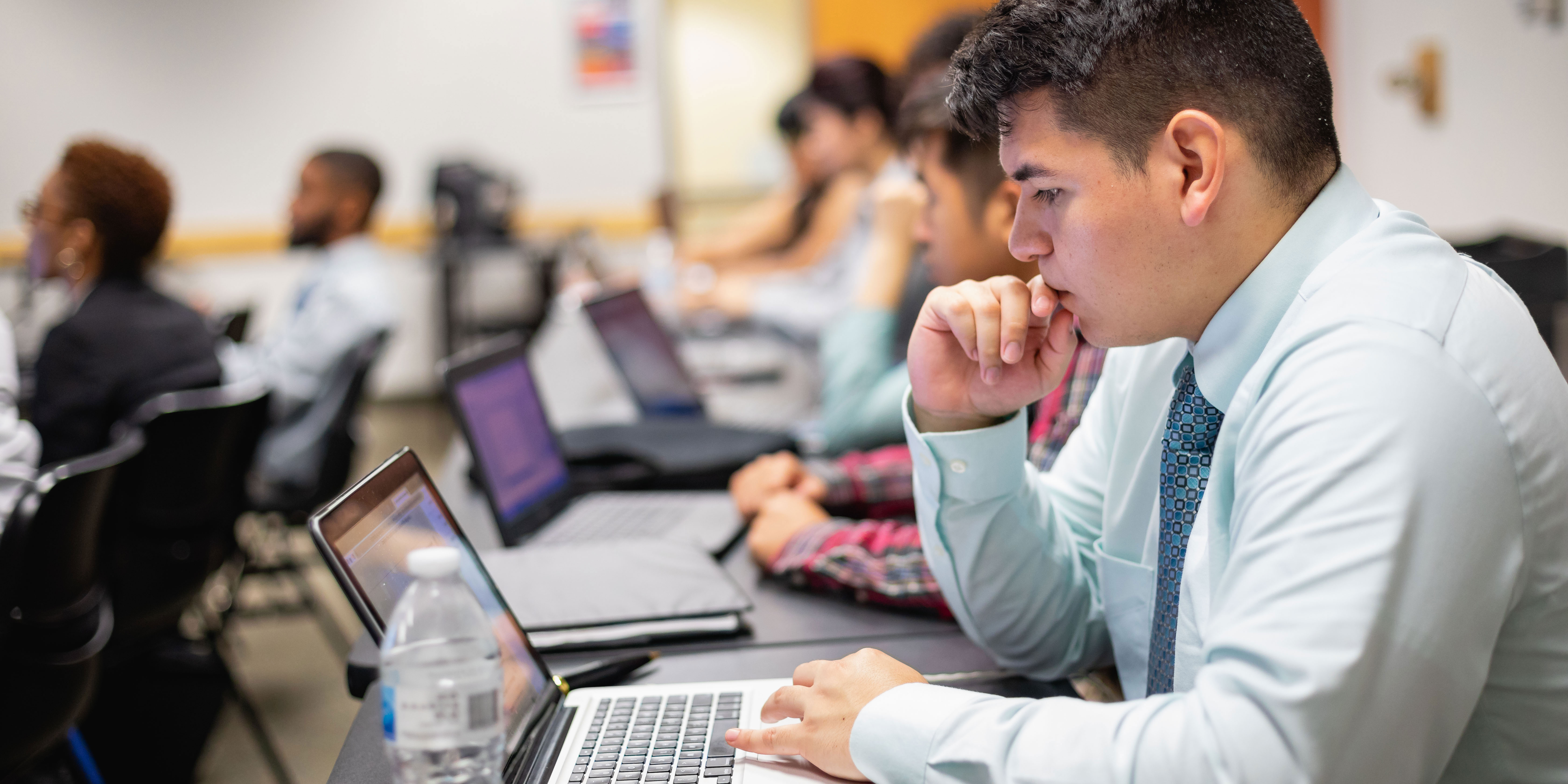 Digital Marketing Professional working on laptop