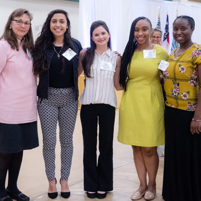 group of students in professional dress at a Foundation event