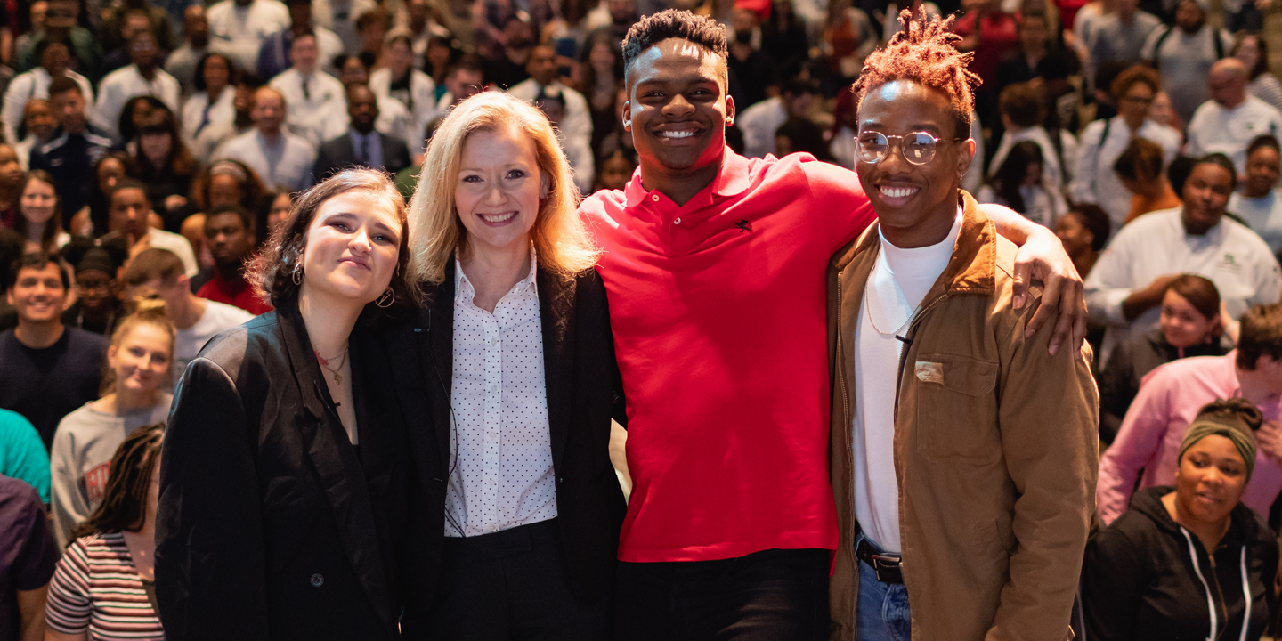 group of students with President Dr. Deitemeyer at a Sensoria event