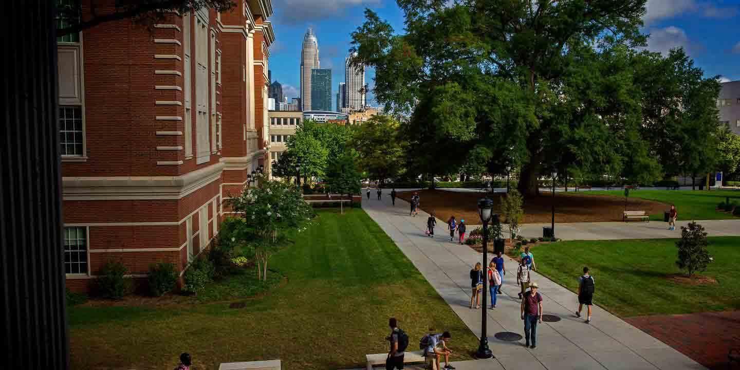 view of downtown from Central Campus with students walking around