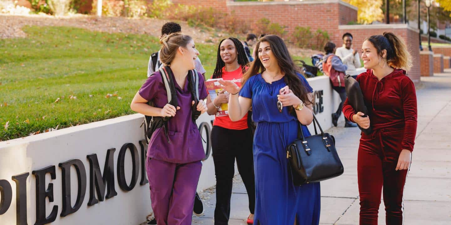 group of students walking on campus