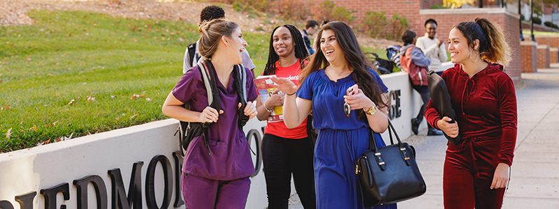 students walking on campus