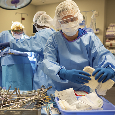 practicing surgery in an operating room