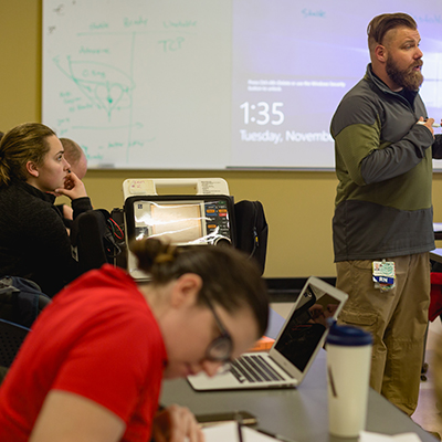 faculty and students in classroom